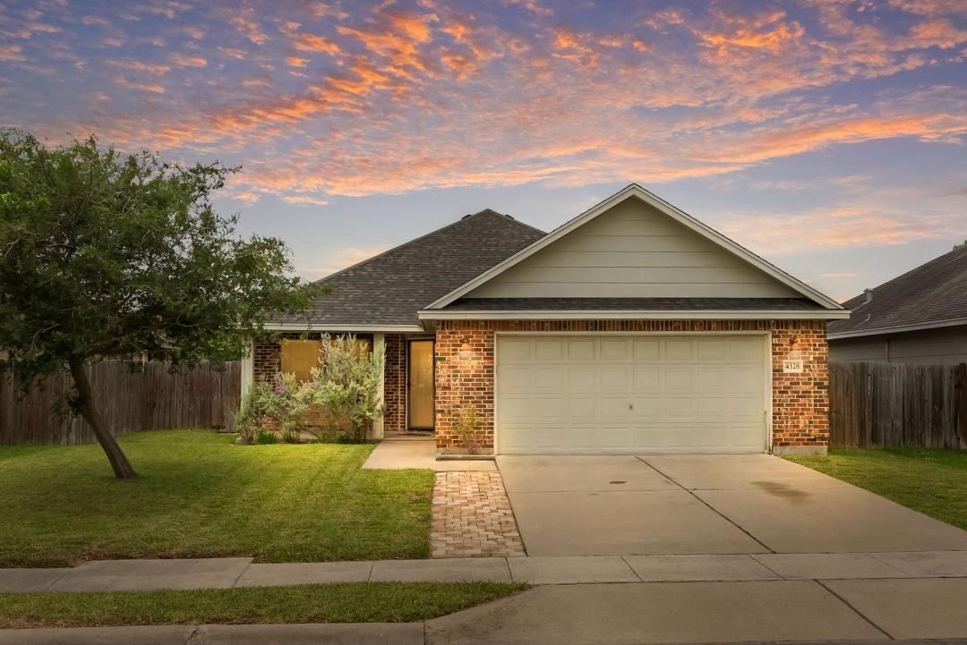 4328 Bratton Road Corpus Christi, TX 78413 - Photo 24 of 24 a front view of a house with garden