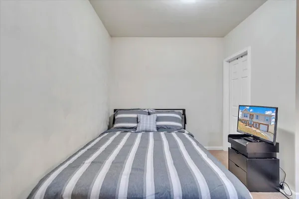 a bedroom with furniture and a couch