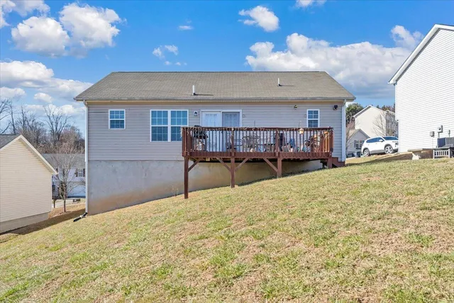 a view of a balcony with furniture