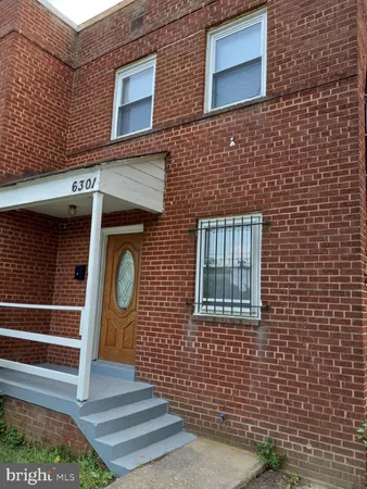 a front view of a house with a door