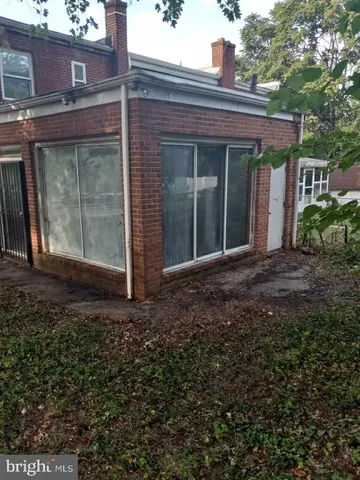 a view of a house with a garden