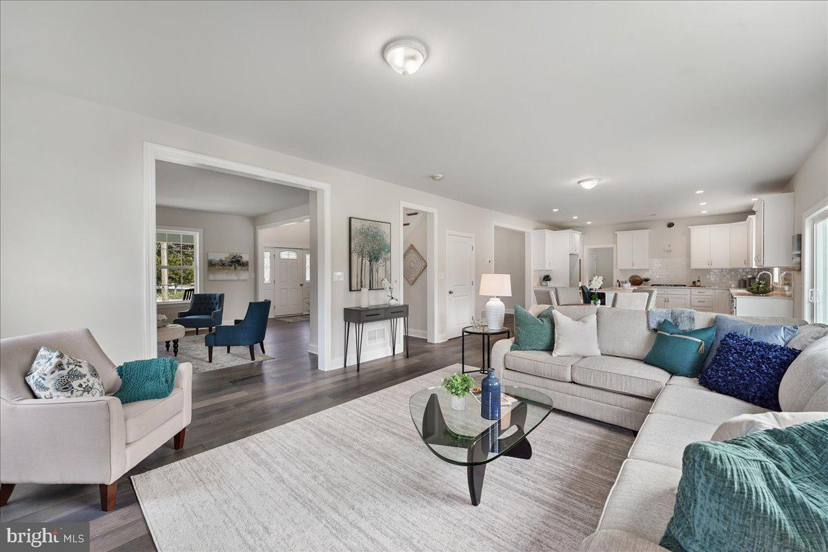 1240 Gradyville Road Glen Mills, PA 19342 - Photo 14 of 39 a living room with furniture and view of kitchen