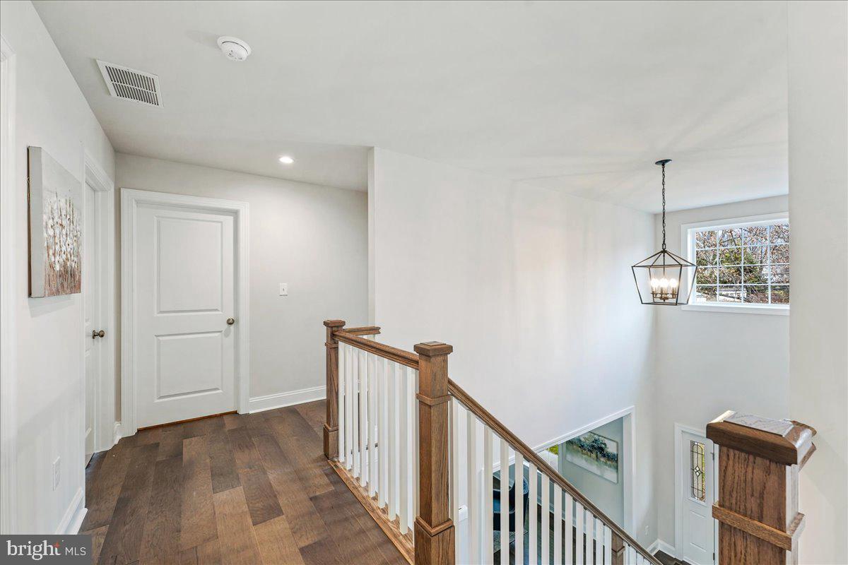 1240 Gradyville Road Glen Mills, PA 19342 - Photo 22 of 39 a view of a hallway with windows