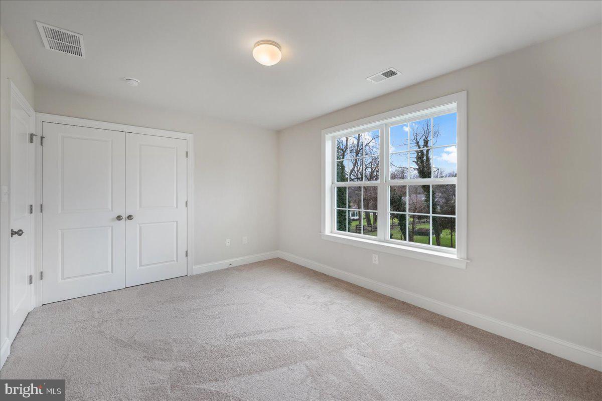 1240 Gradyville Road Glen Mills, PA 19342 - Photo 28 of 39 a view of an empty room with a window
