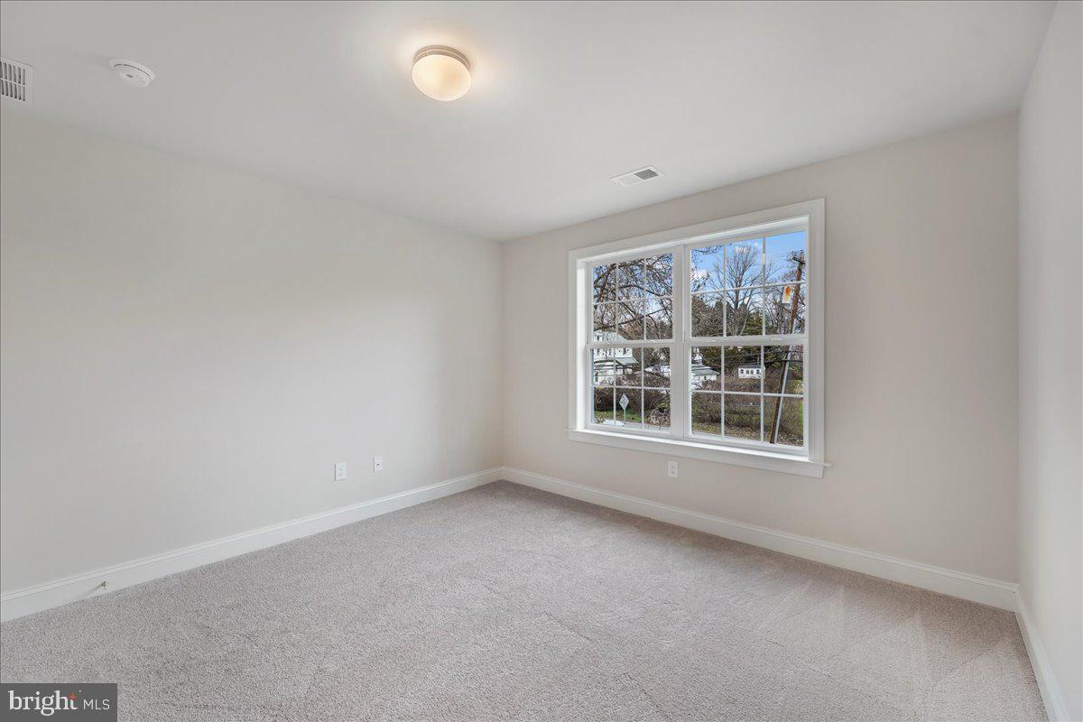 1240 Gradyville Road Glen Mills, PA 19342 - Photo 31 of 39 an empty room with a window