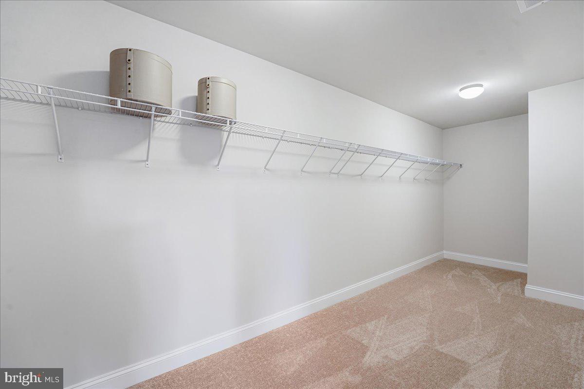 1240 Gradyville Road Glen Mills, PA 19342 - Photo 35 of 39 a view of a room with racks on the wall