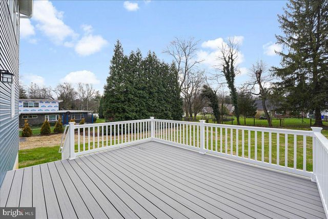 a view of a house with a deck