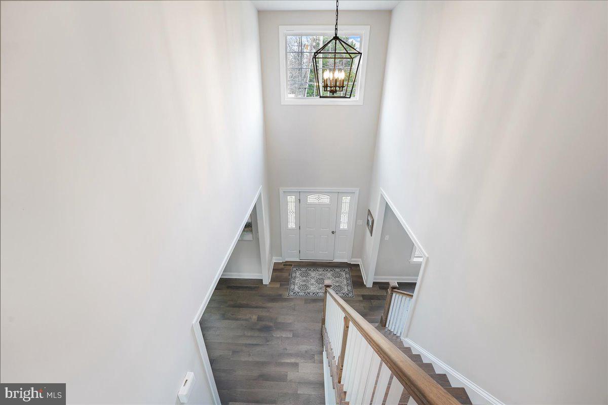 1240 Gradyville Road Glen Mills, PA 19342 - Photo 6 of 39 a view of a kitchen from a hallway