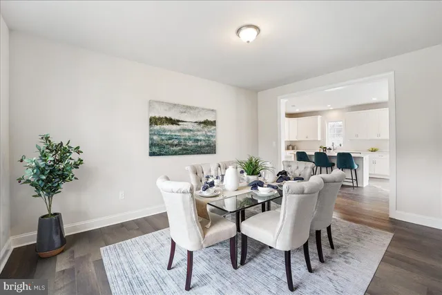 a view of a livingroom with furniture and a table