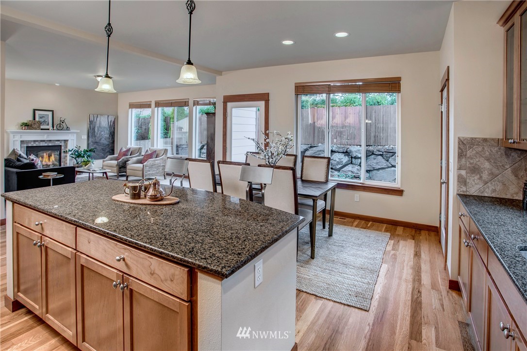 3811 222nd Place Southeast Bothell, WA 98021 - Photo 11 of 35 a kitchen with sink and view of living room