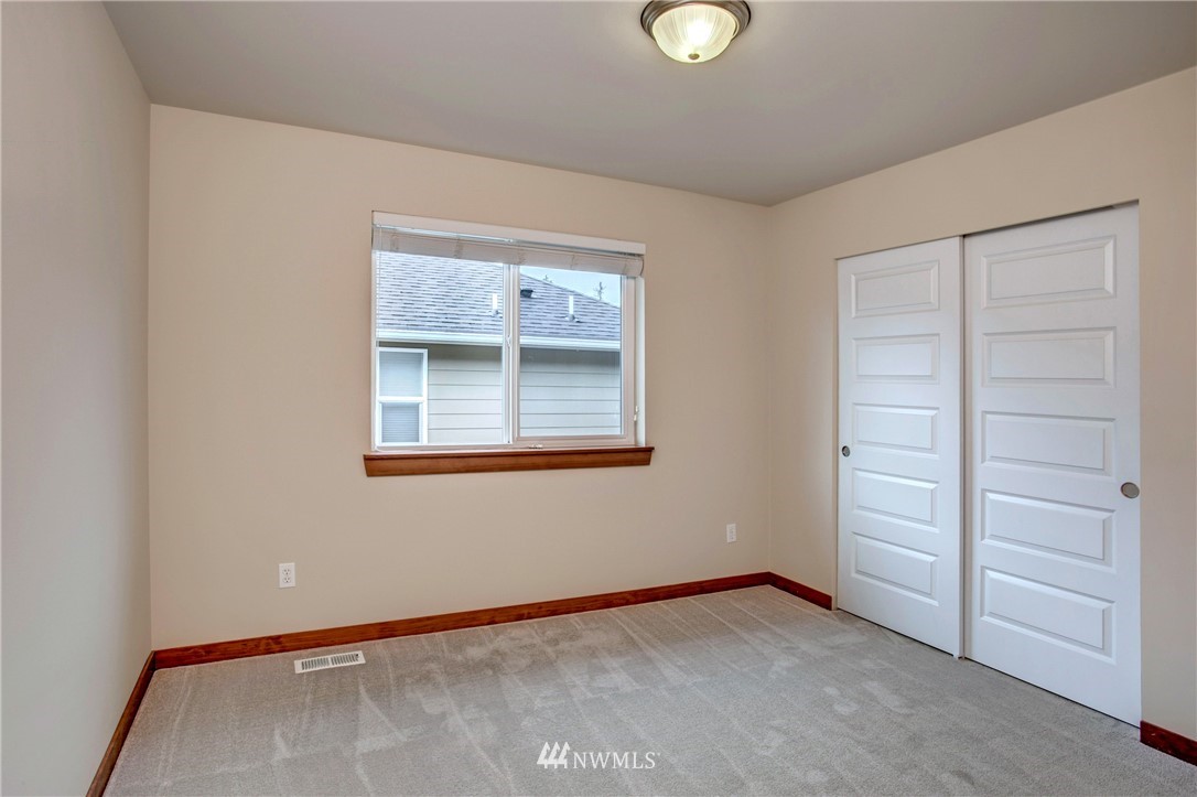3811 222nd Place Southeast Bothell, WA 98021 - Photo 26 of 35 a view of an empty room with a window