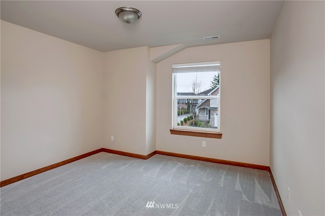 3811 222nd Place Southeast Bothell, WA 98021 - Photo 28 of 35 an empty room with a window