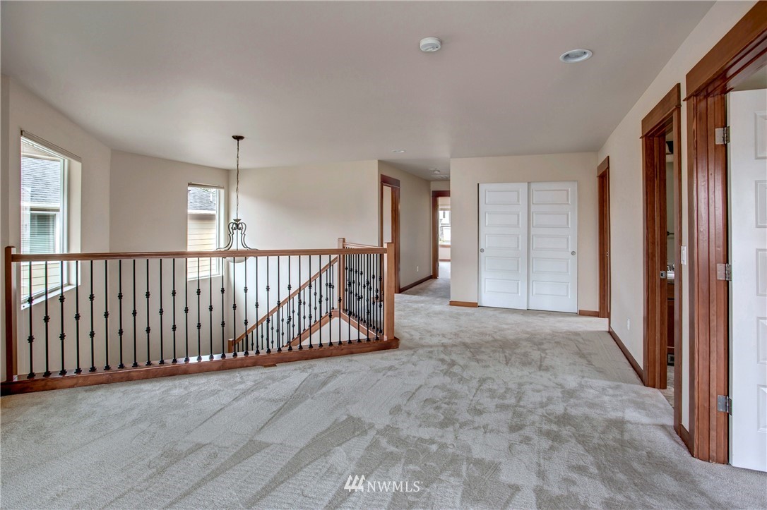 3811 222nd Place Southeast Bothell, WA 98021 - Photo 29 of 35 an empty room with windows
