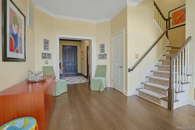 a view of entryway with wooden floor