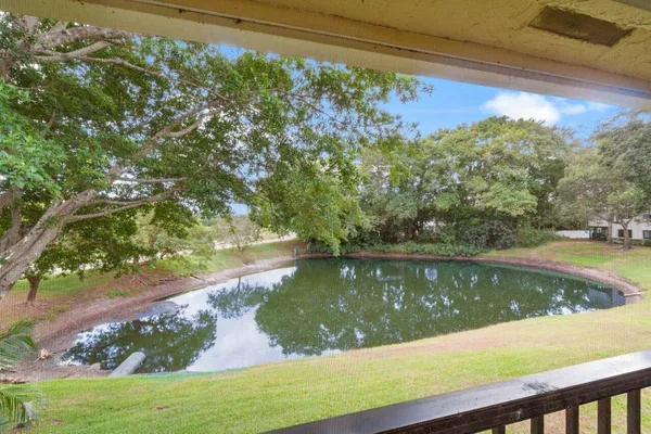 a view of a lake from a balcony