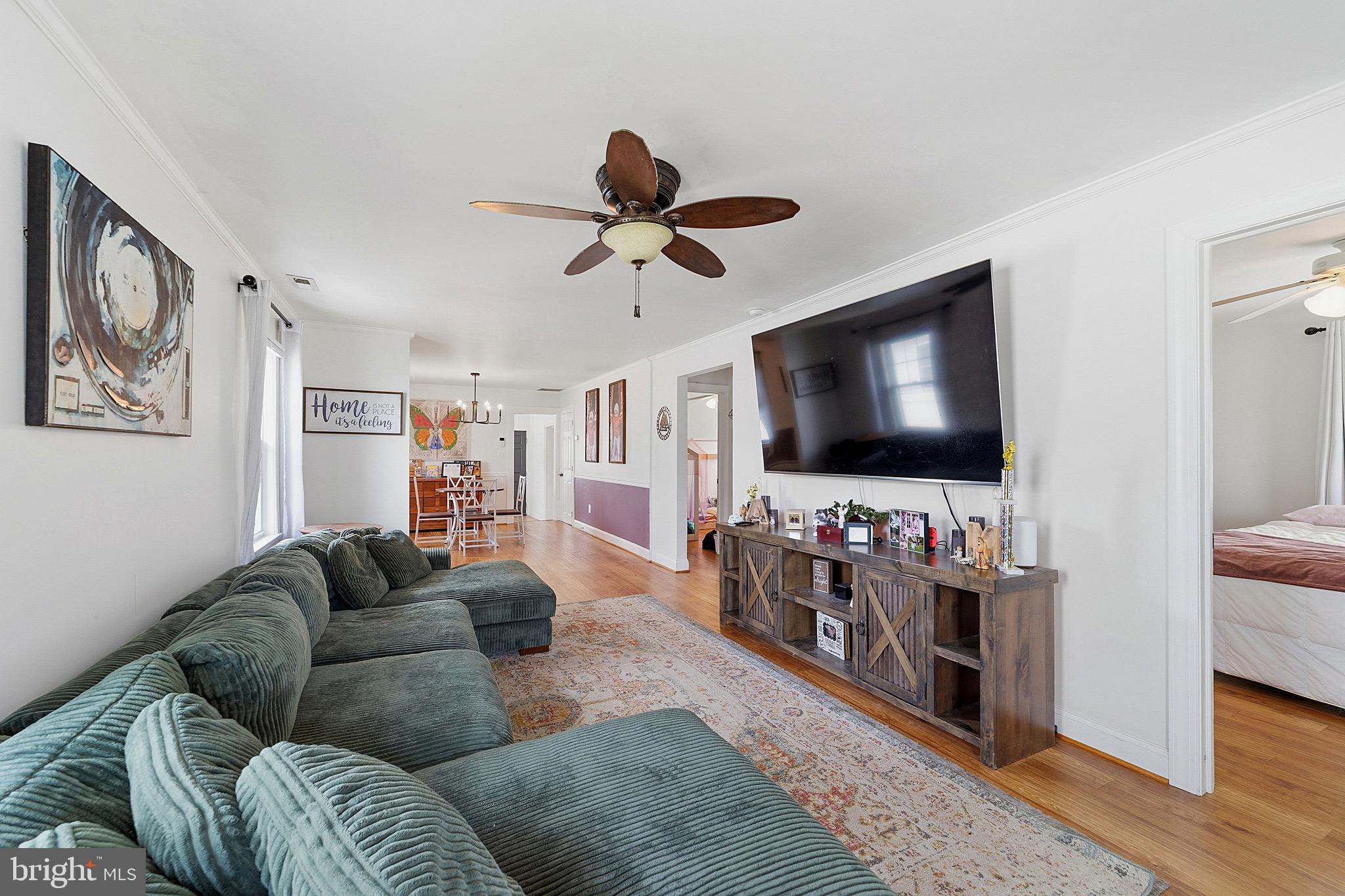 15 South Clinton Avenue Maple Shade, NJ 08052 - Photo 4 of 29 a living room with furniture and a flat screen tv