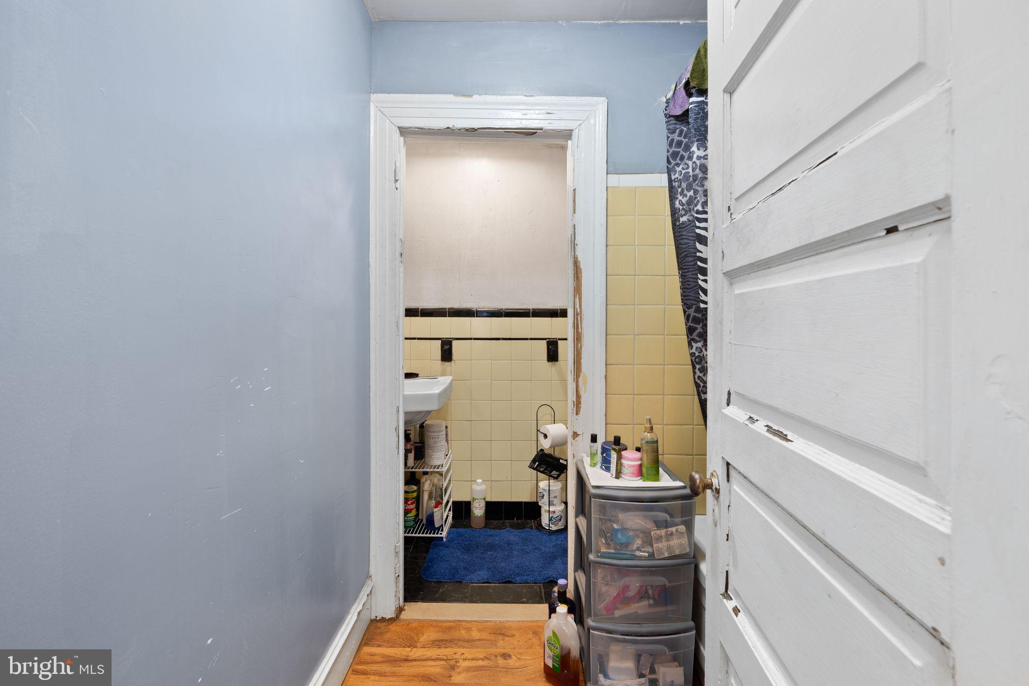 4600 Wayne Avenue Philadelphia, PA 19144 - Photo 11 of 25 a view of a hallway with wooden floor and staircase
