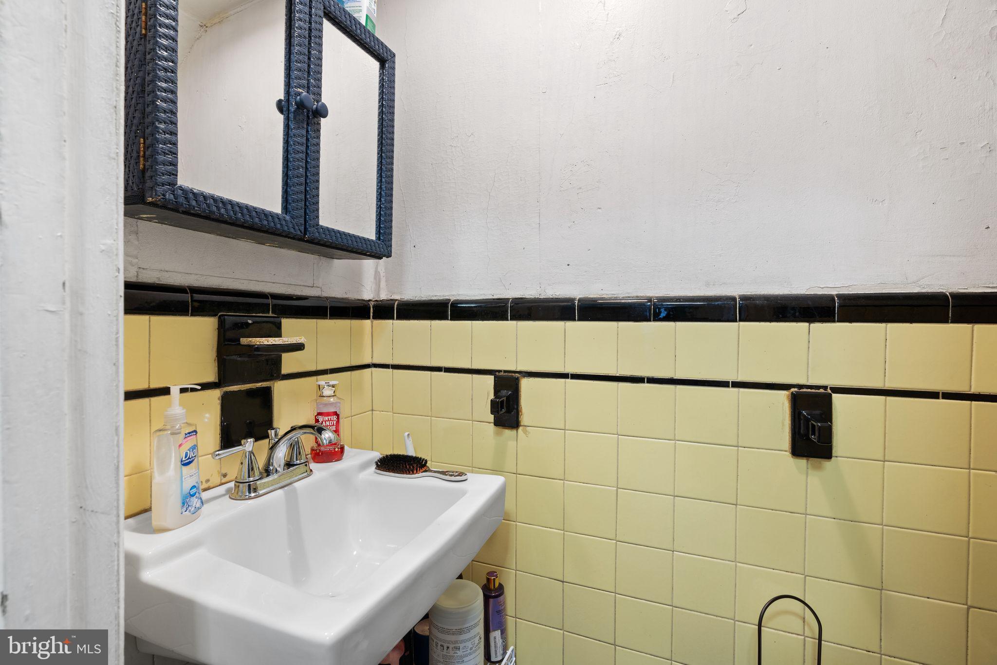 4600 Wayne Avenue Philadelphia, PA 19144 - Photo 13 of 25 a bathroom with a sink and a shower