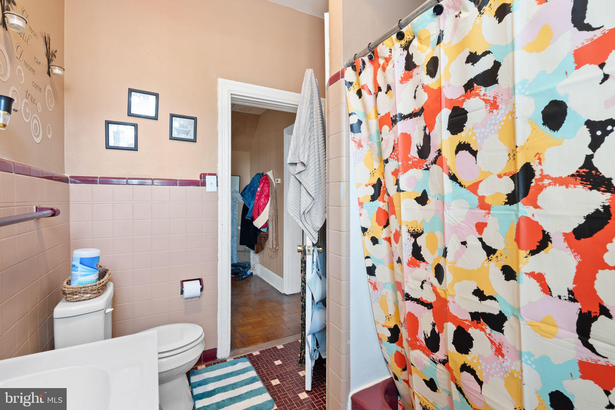 4600 Wayne Avenue Philadelphia, PA 19144 - Photo 19 of 25 a bathroom with a sink and toilet