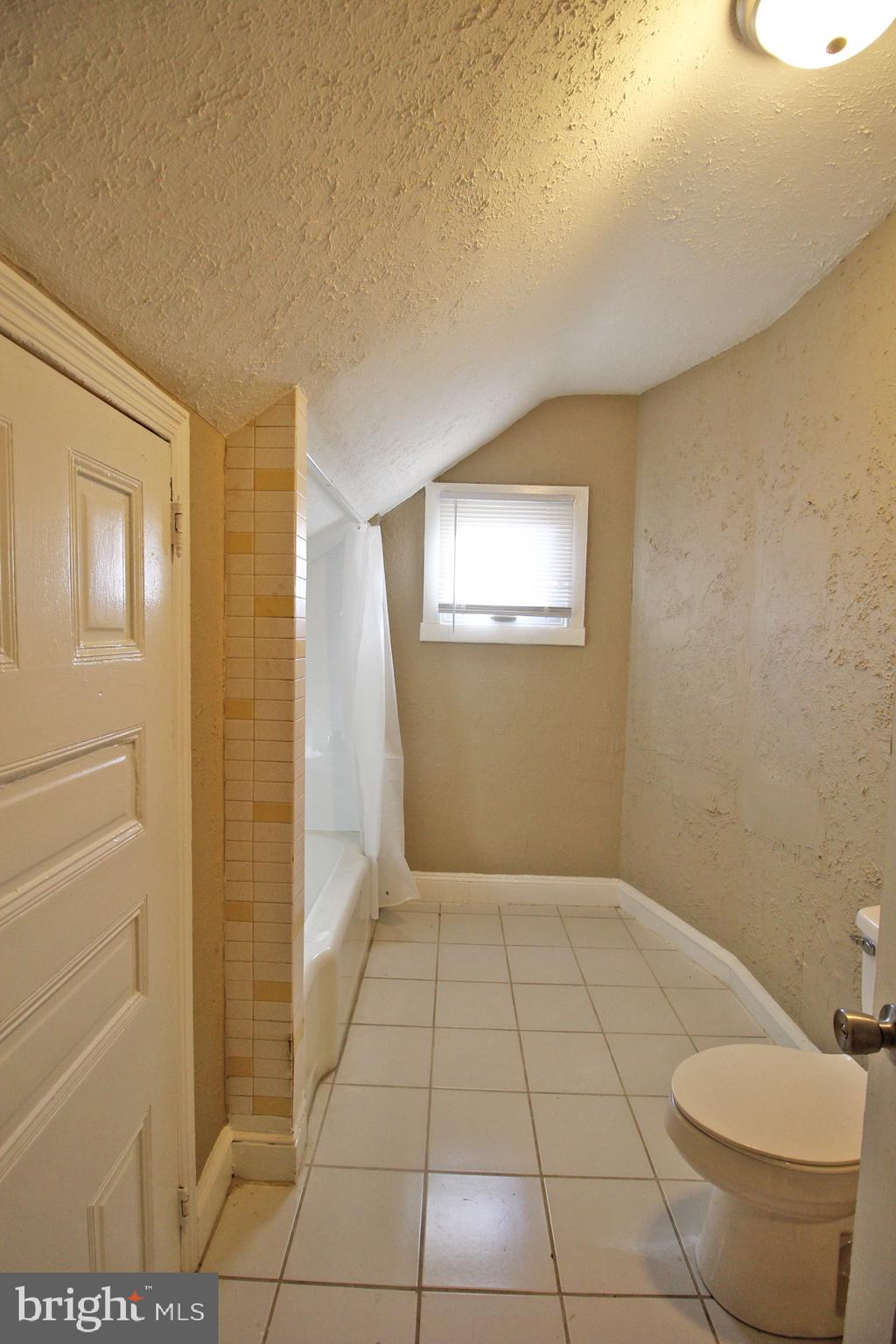 4600 Wayne Avenue Philadelphia, PA 19144 - Photo 8 of 25 a bathroom with a sink and toilet