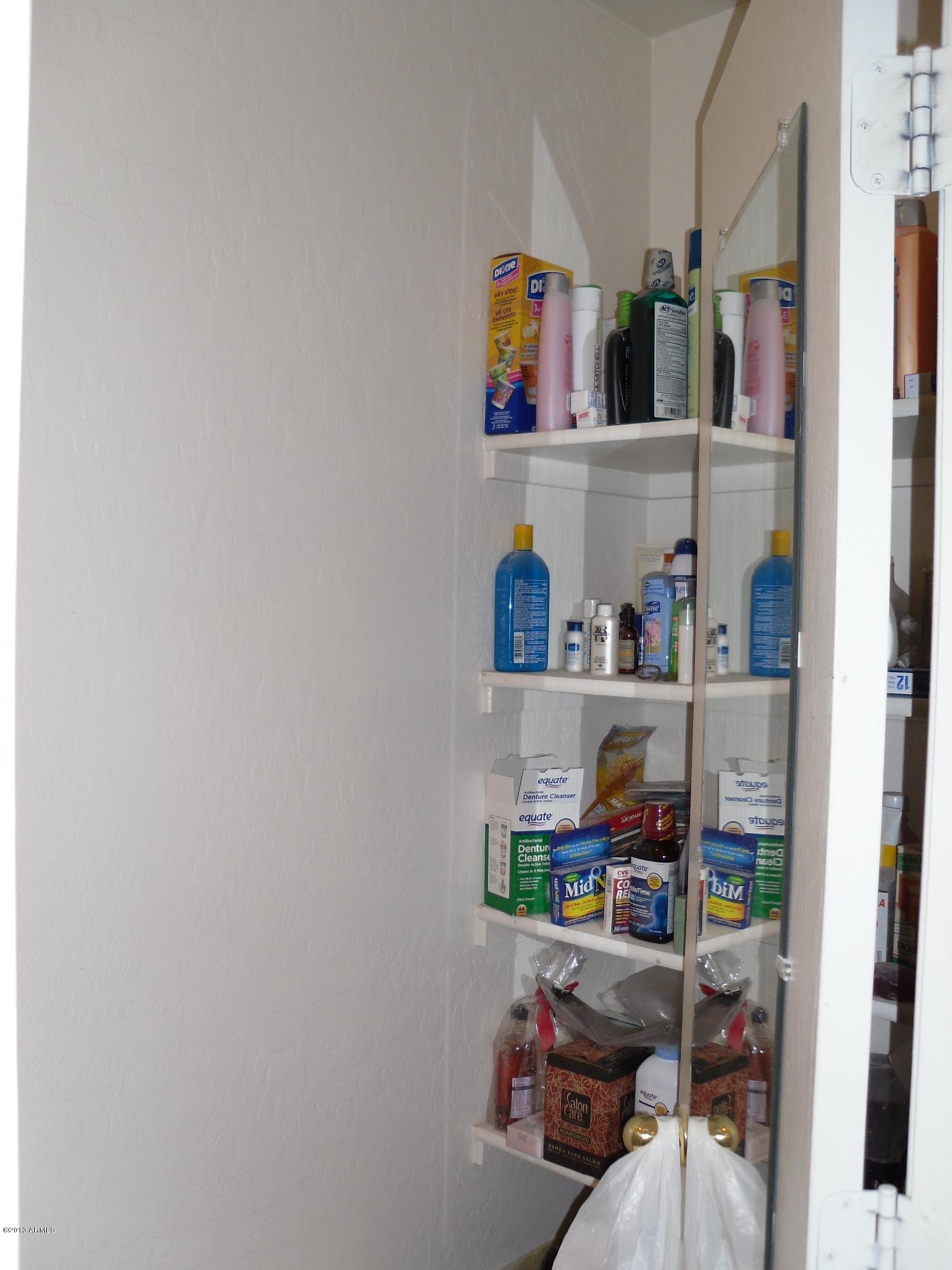 3807 South Conestoga Road Apache Junction, AZ 85119 - Photo 10 of 16 Master bath linen or supply storage