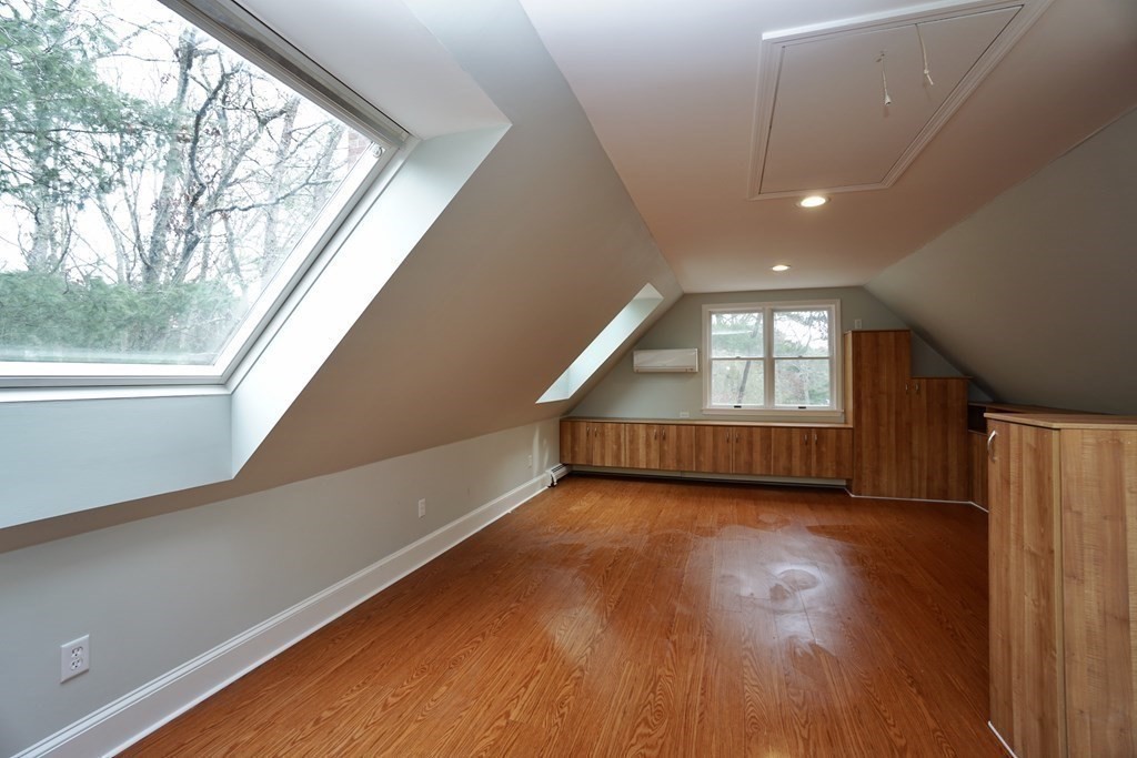 44 Avalon Circle Barnstable, MA 02655 - Photo 17 of 42 a view of an empty room with wooden floor and a window