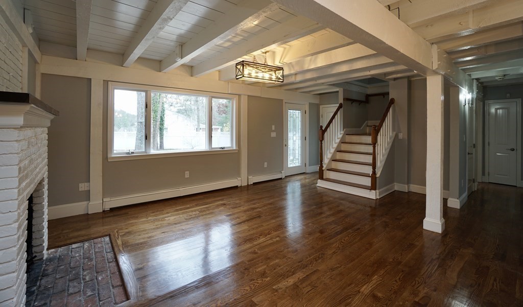44 Avalon Circle Barnstable, MA 02655 - Photo 20 of 42 a view of an empty room with wooden floor and a window