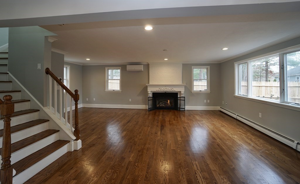 44 Avalon Circle Barnstable, MA 02655 - Photo 24 of 42 a view of empty room with wooden floor and a floor to ceiling window