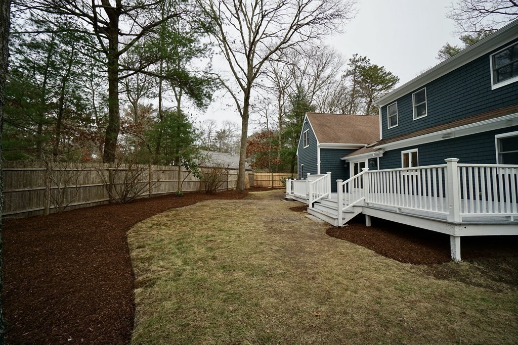 44 Avalon Circle Barnstable, MA 02655 - Photo 31 of 42 a view of a house with backyard and deck