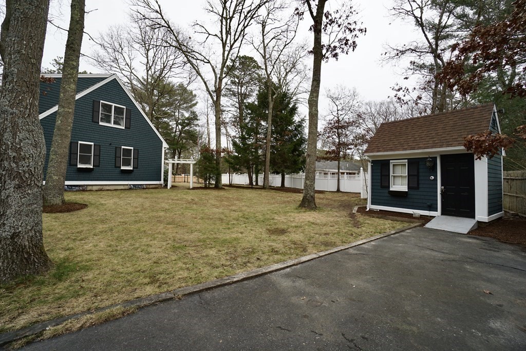 44 Avalon Circle Barnstable, MA 02655 - Photo 32 of 42 a view of a house with a yard and large tree