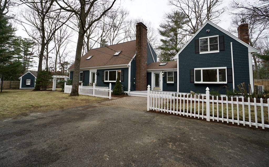 44 Avalon Circle Barnstable, MA 02655 - Photo 35 of 42 a front view of a house with a garden