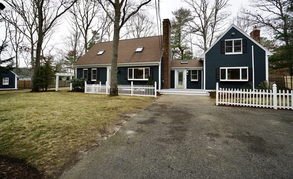 44 Avalon Circle Barnstable, MA 02655 - Photo 36 of 42 a front view of a house with a yard