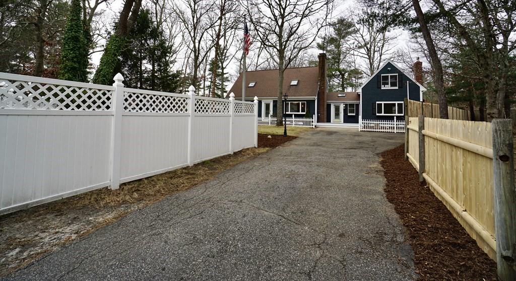 44 Avalon Circle Barnstable, MA 02655 - Photo 37 of 42 a front view of a house with a yard