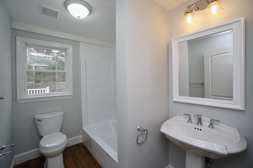 44 Avalon Circle Barnstable, MA 02655 - Photo 38 of 42 a bathroom with a sink toilet and a mirror