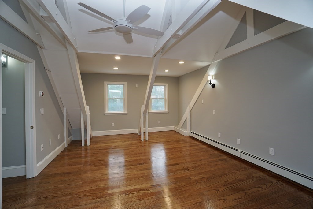44 Avalon Circle Barnstable, MA 02655 - Photo 8 of 42 a view of an empty room with window and wooden floor