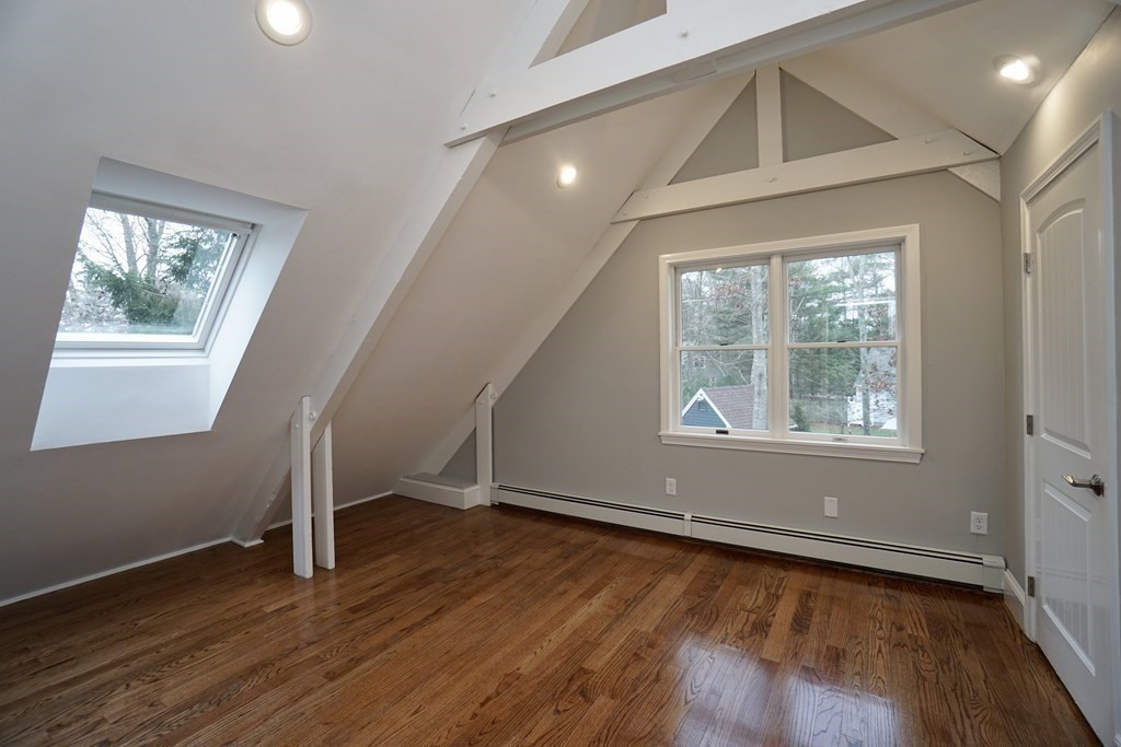 44 Avalon Circle Barnstable, MA 02655 - Photo 10 of 42 a view of an empty room with wooden floor and a window