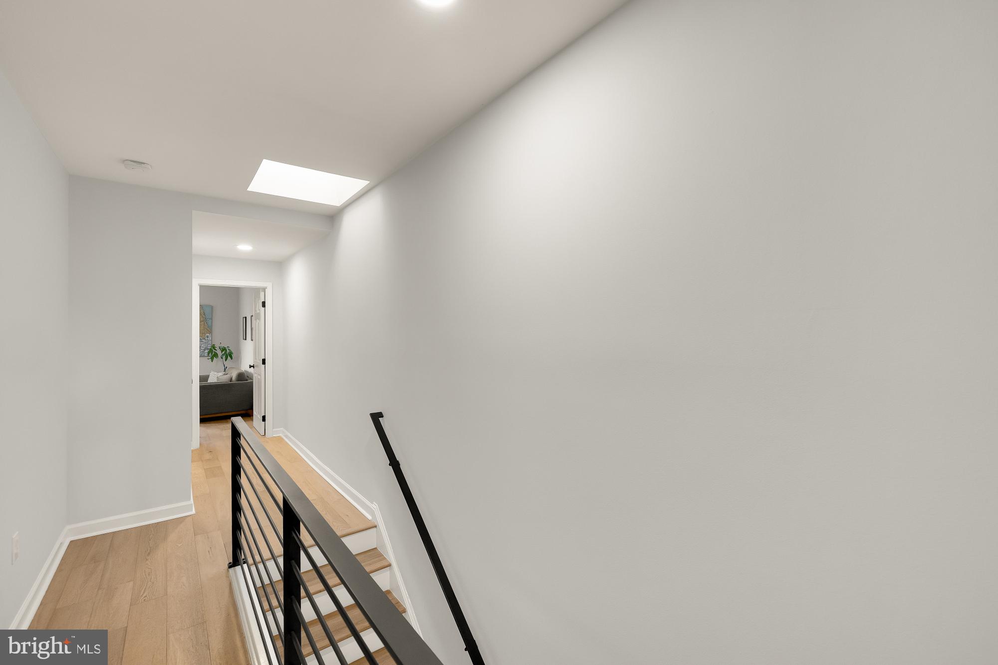 1834 6th Street Northwest Washington, DC 20001 - Photo 21 of 36 a view of a hallway with wooden floor and staircase