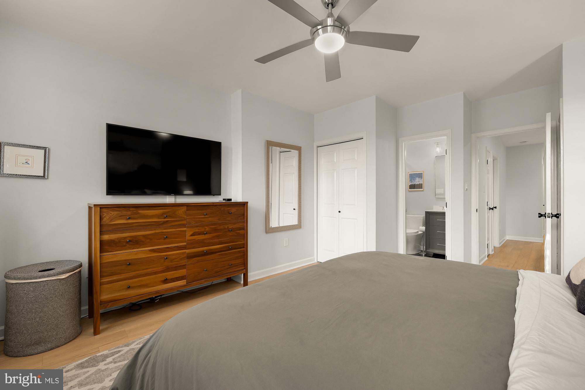1834 6th Street Northwest Washington, DC 20001 - Photo 24 of 36 a bedroom with a bed and a flat screen tv