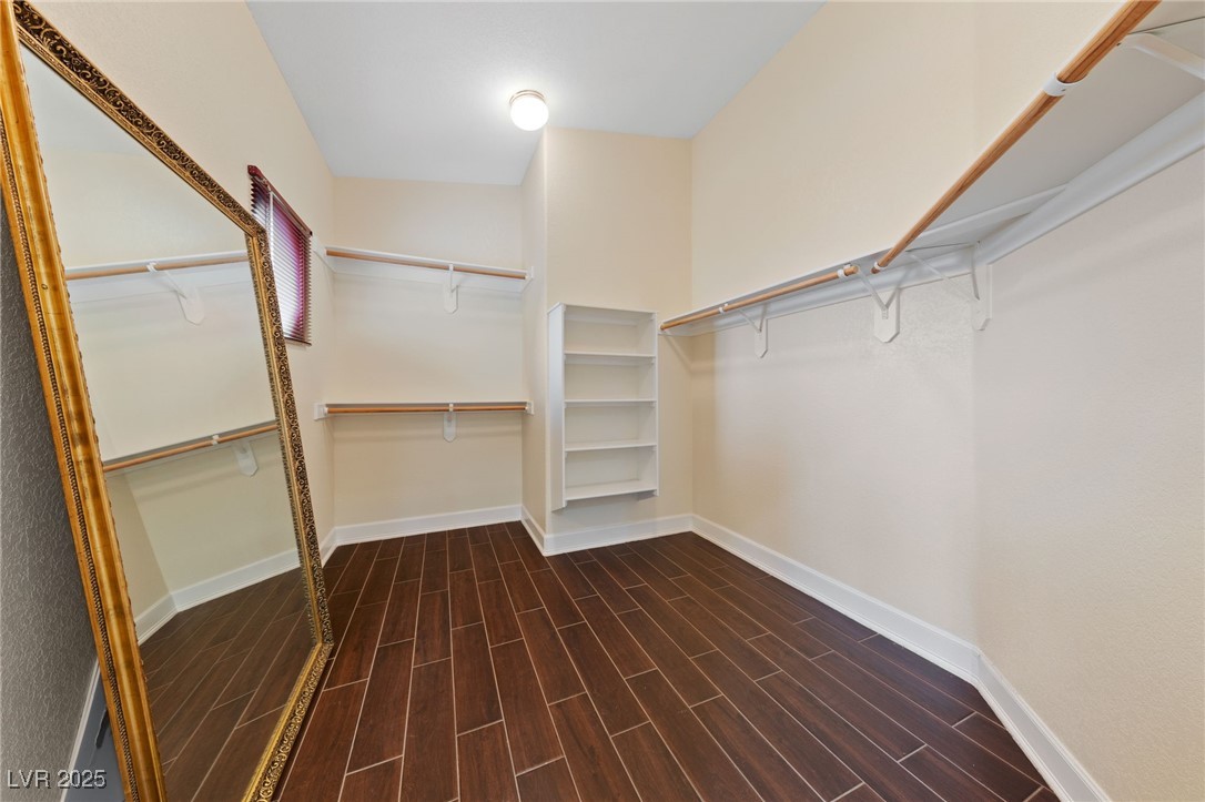 1056 Calico Ridge Drive Henderson, NV 89011 - Photo 29 of 67 Walk in closet with dark wood-style flooring