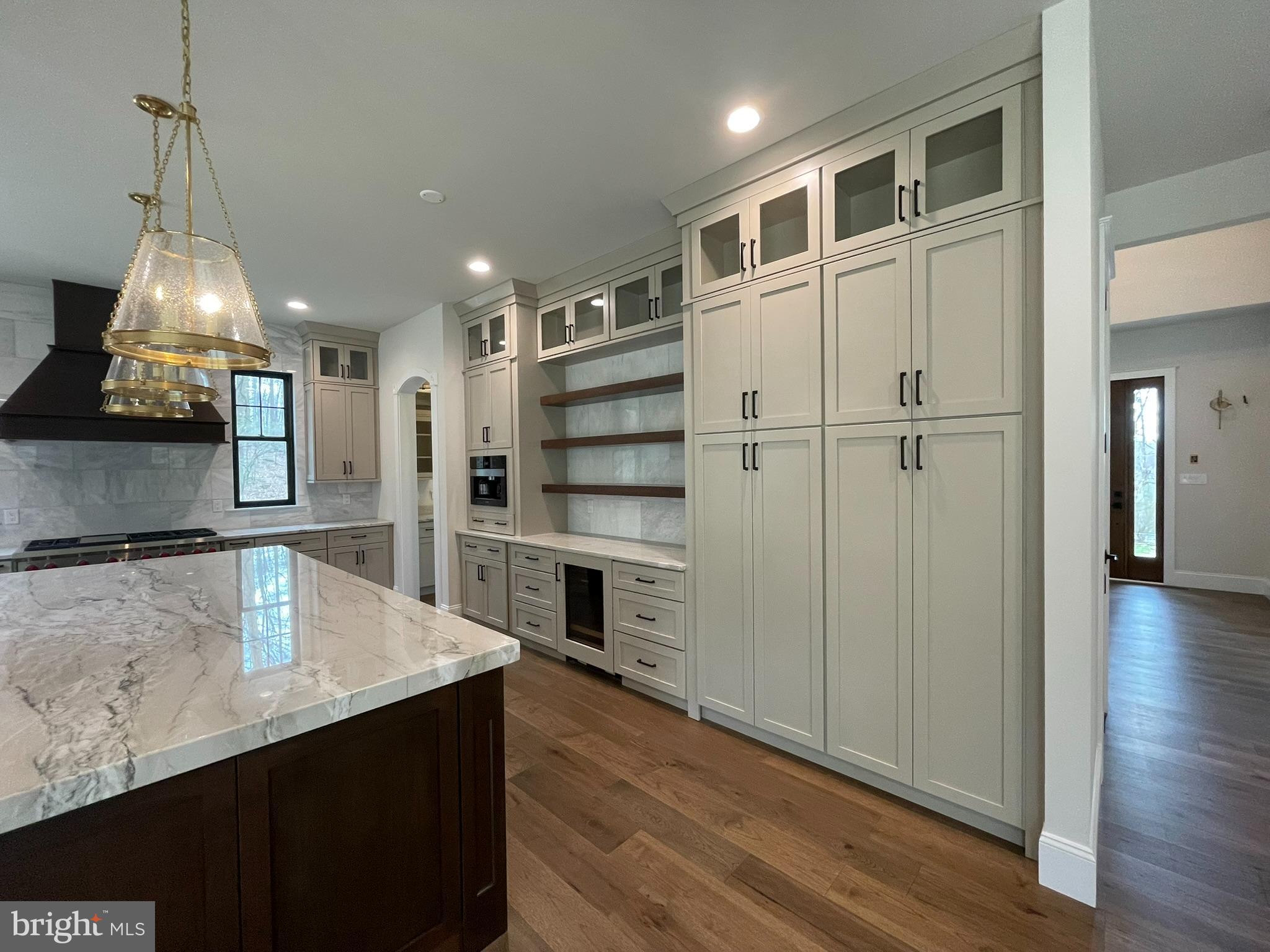 380 Zynn Road Downingtown, PA 19335 - Photo 14 of 53 a kitchen with a refrigerator and a sink