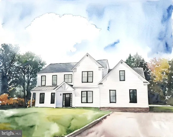 a view of a white house with a big yard and large trees