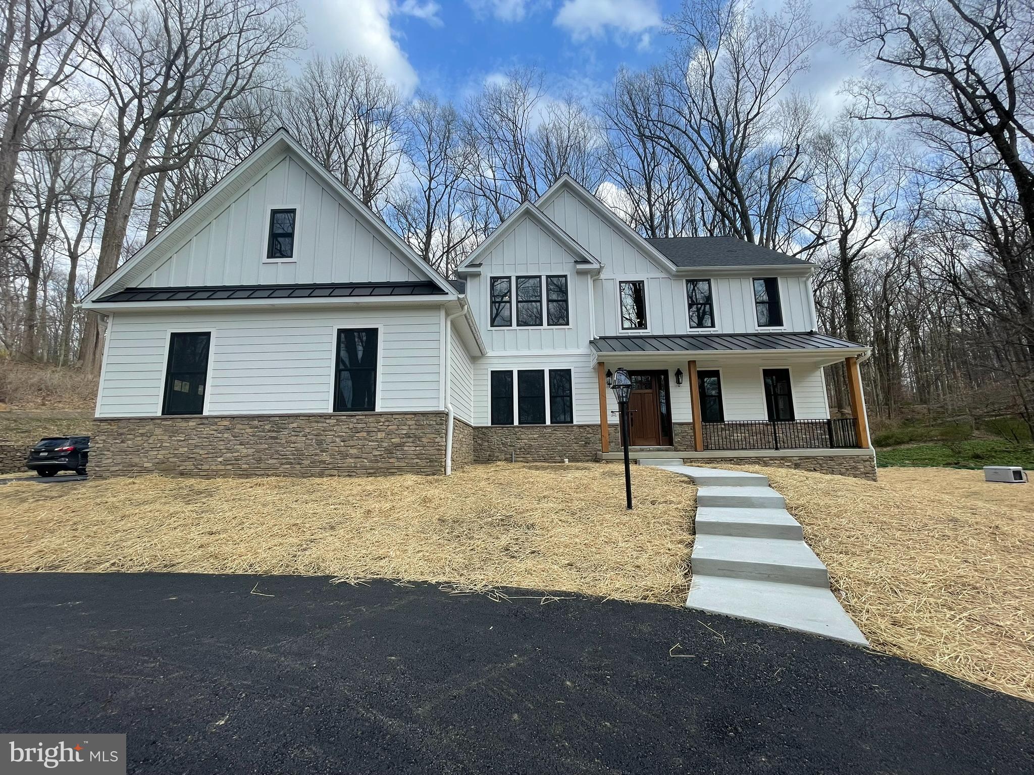 380 Zynn Road Downingtown, PA 19335 - Photo 28 of 53 a front view of a house with a yard