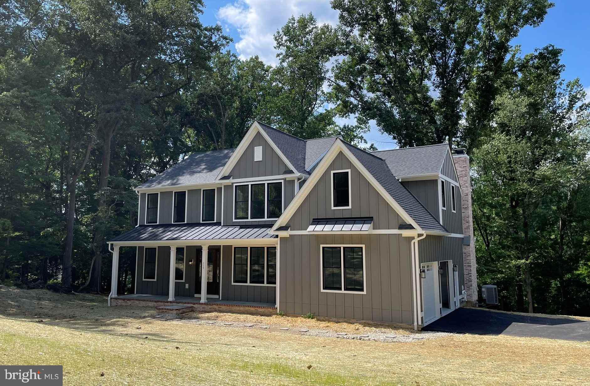 380 Zynn Road Downingtown, PA 19335 - Photo 30 of 53 a front view of a house with a garden