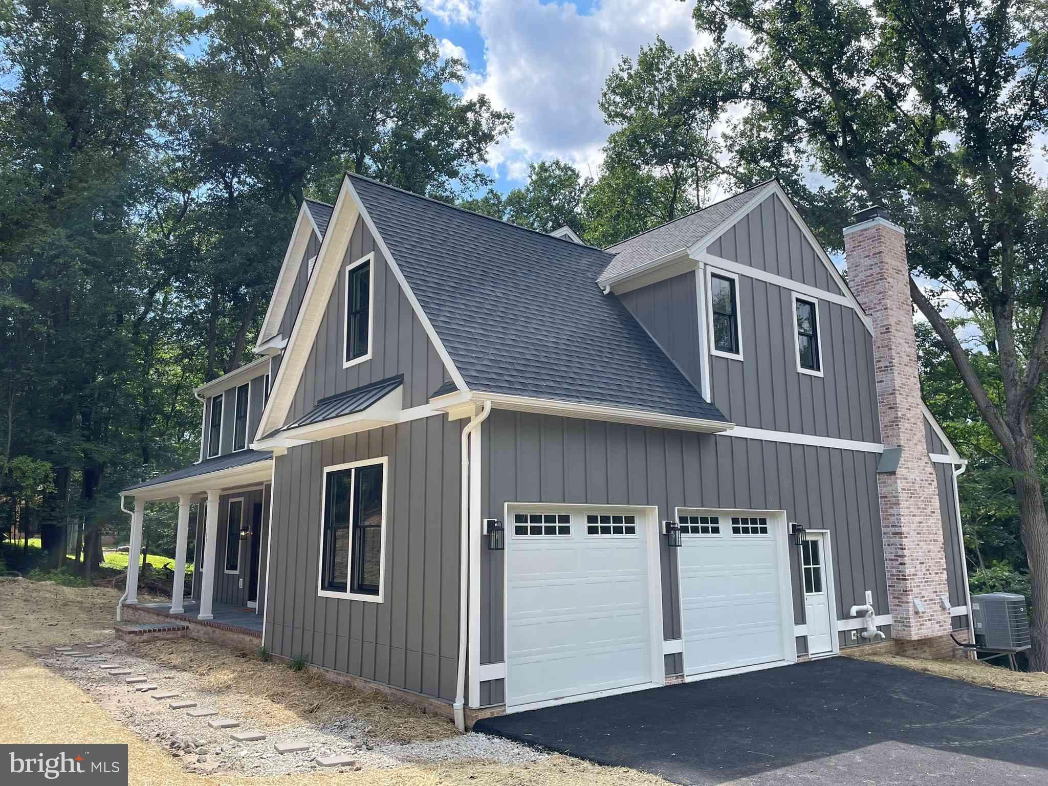 380 Zynn Road Downingtown, PA 19335 - Photo 31 of 53 a front view of a house with a garage