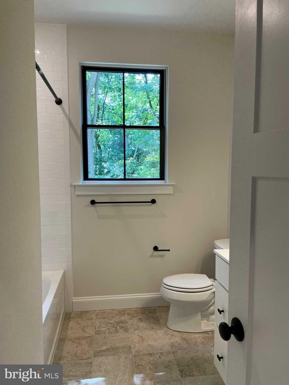 380 Zynn Road Downingtown, PA 19335 - Photo 52 of 53 a bathroom with a toilet and a shower