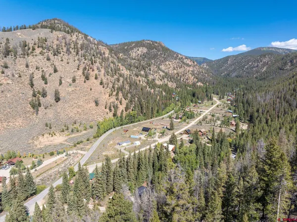 a view of a mountain view with mountains in the background