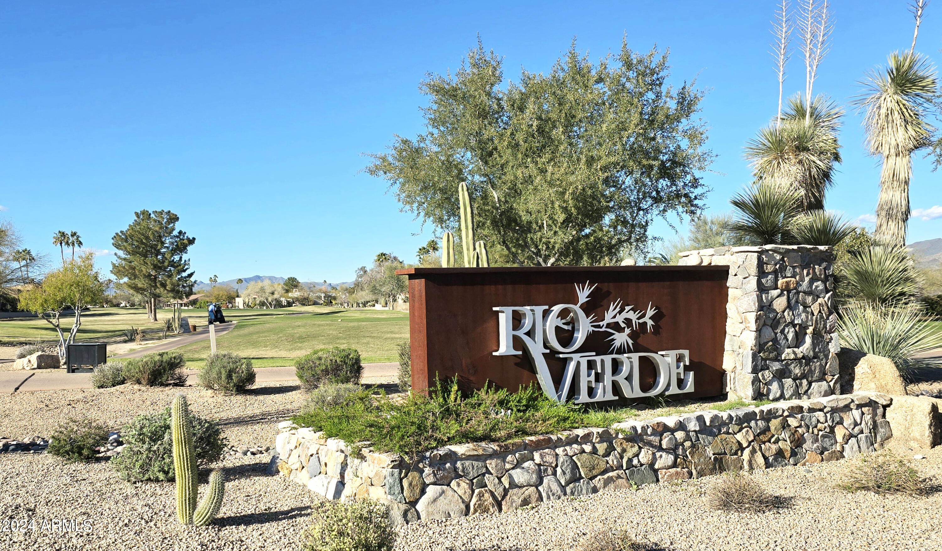 26005 North Rio Lane Rio Verde, AZ 85263 - Photo 1 of 12 1 rio verde sign with golf course view