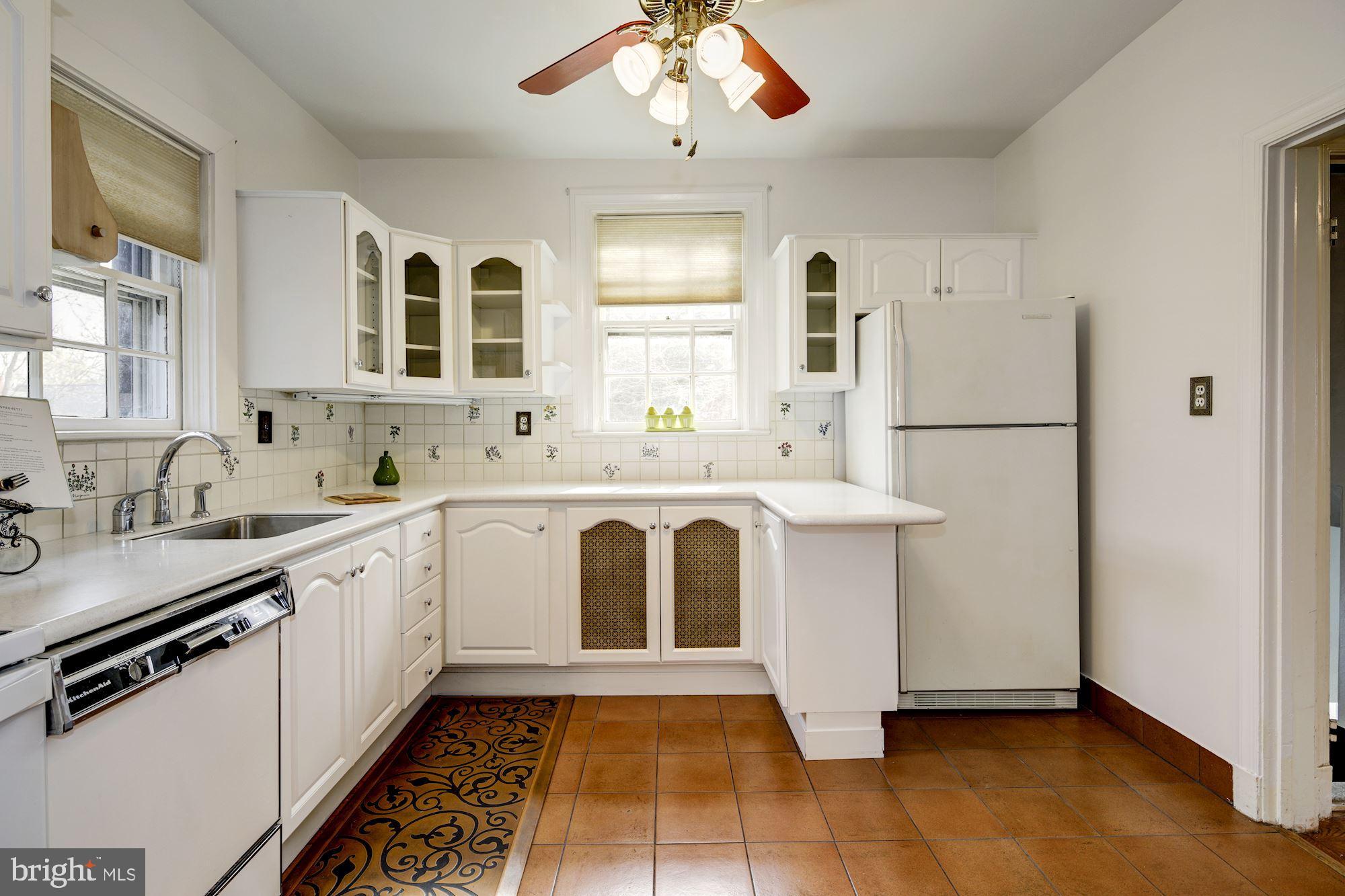 716 Stoneleigh Road Baltimore, MD 21212 - Photo 20 of 44 Kitchen w/ Corian counters, recent cabs.