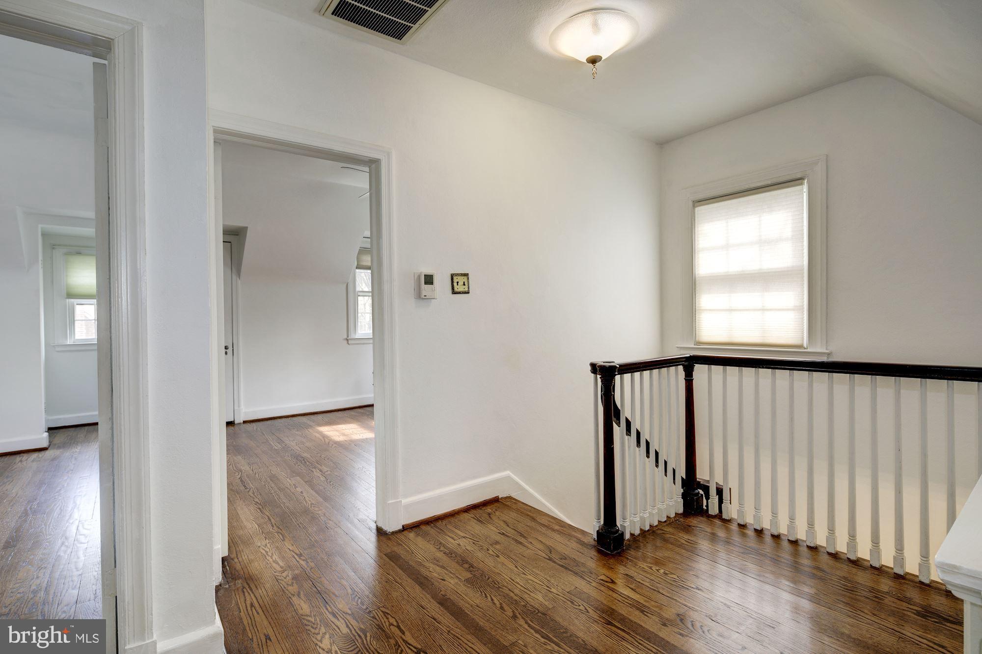 716 Stoneleigh Road Baltimore, MD 21212 - Photo 25 of 44 Second floor hallway. Pull down attic stairs.