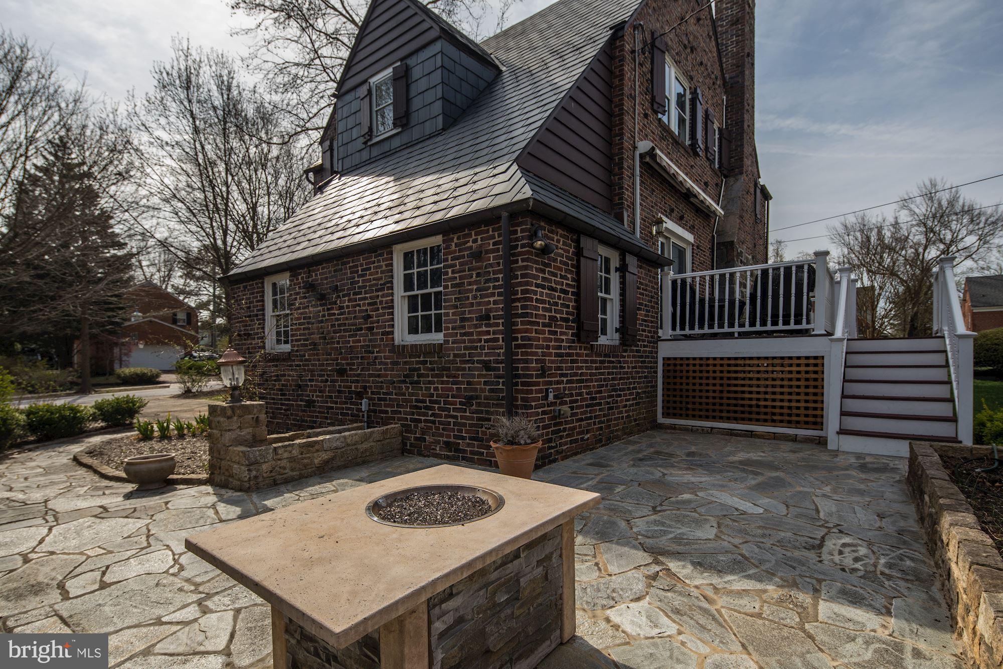 716 Stoneleigh Road Baltimore, MD 21212 - Photo 42 of 44 Fire pit included. Flagstone patio.